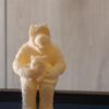 Alf figurine holding a cat.